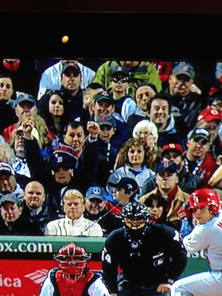Group Taking a Selfie at a Concert Venue