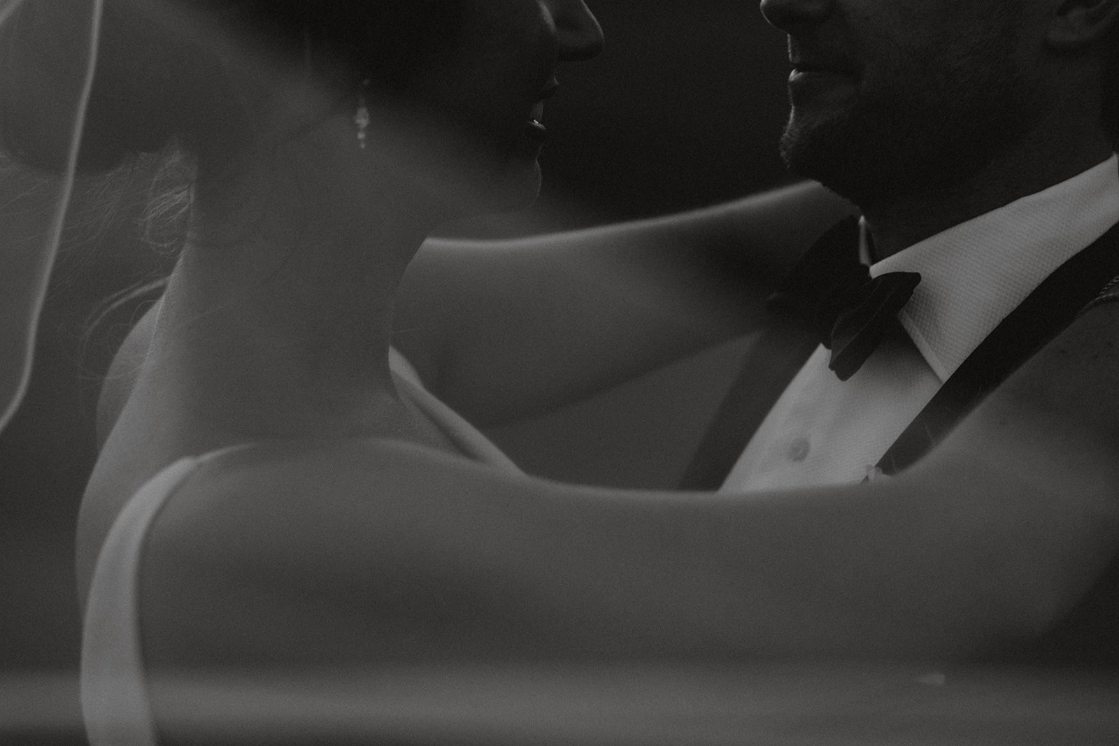 a blurry photo of a person standing in front of a wall