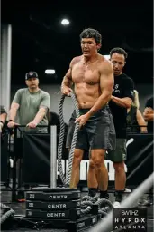 man in black hoodie standing