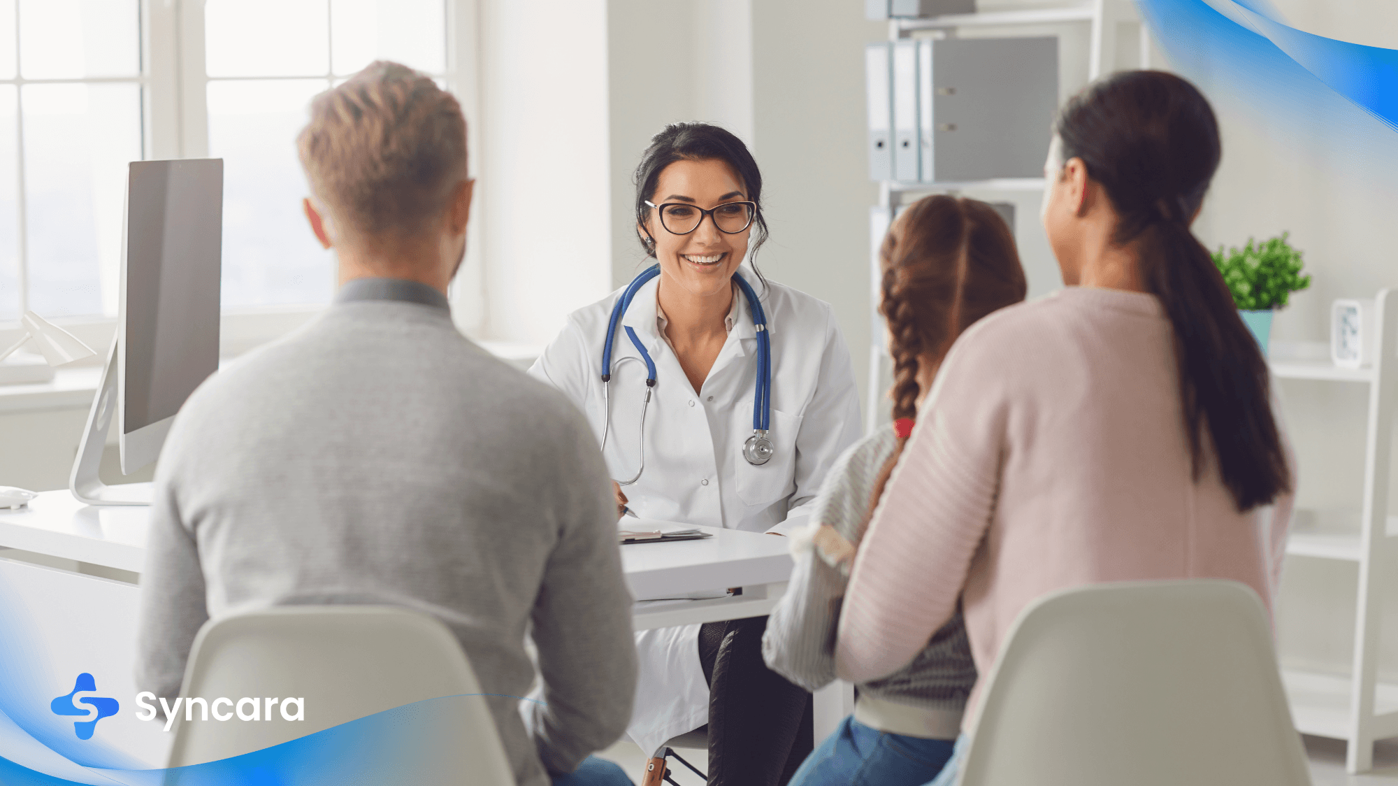 Female doctor at an Ottawa walk-in clinic talking with a family of three about their medical care.