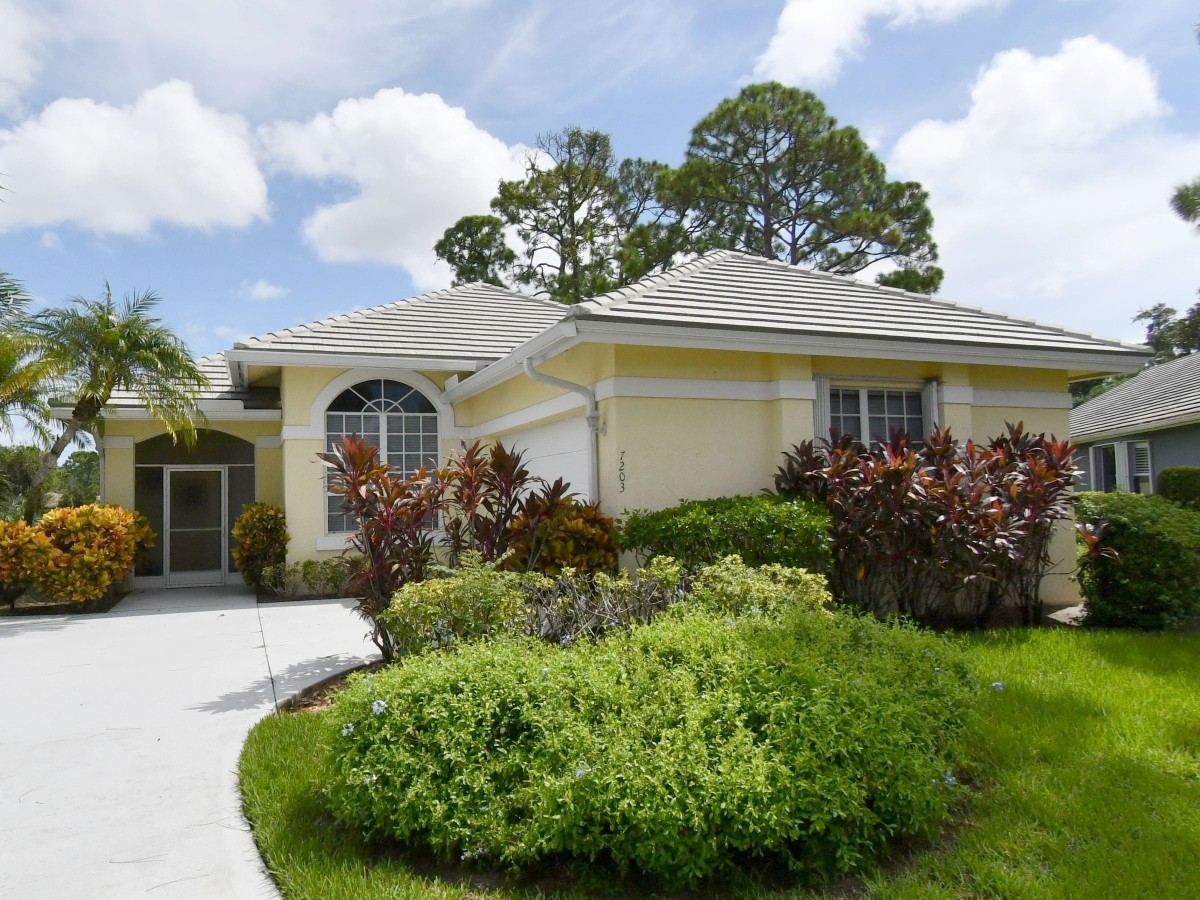 1994 New Roof Construction in Marsh Landing, PGA Village, Port St Lucie with Entegra Flat Broomswept Tile in Natural Gray