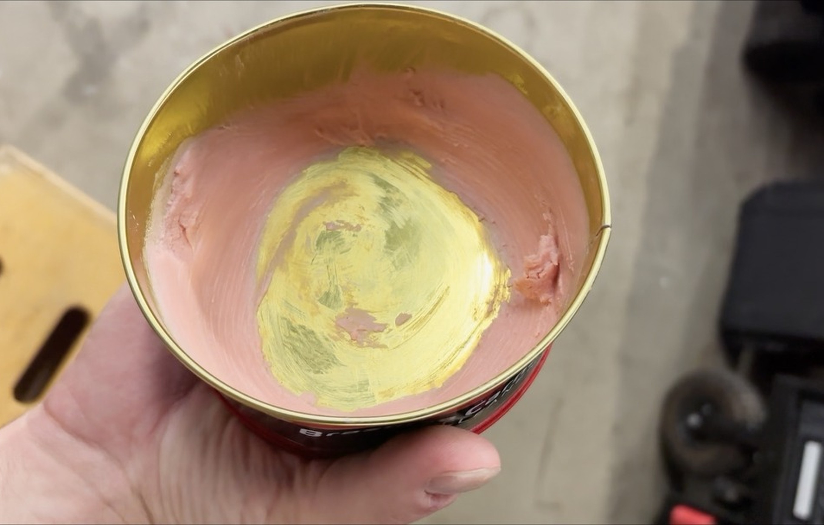 opened tin of Mother's California Gold, paste visible