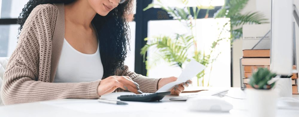people sitting on chair in front of laptop computers