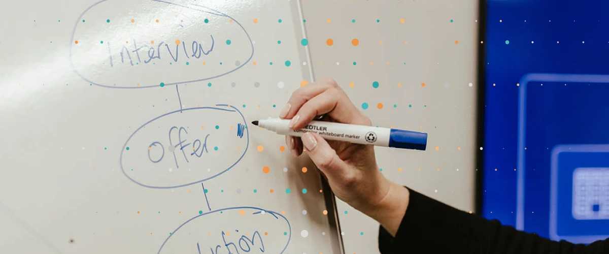 hand and pen planning careers meeting