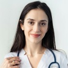 Female physician headshot representing trusted medical professionals in healthcare staffing.