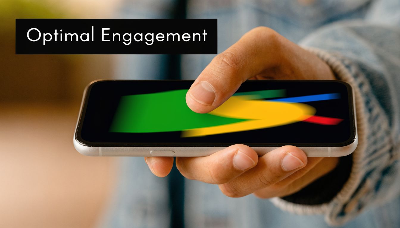 A close-up of a person holding a smartphone showing an abstract motion graphic of colored shapes.