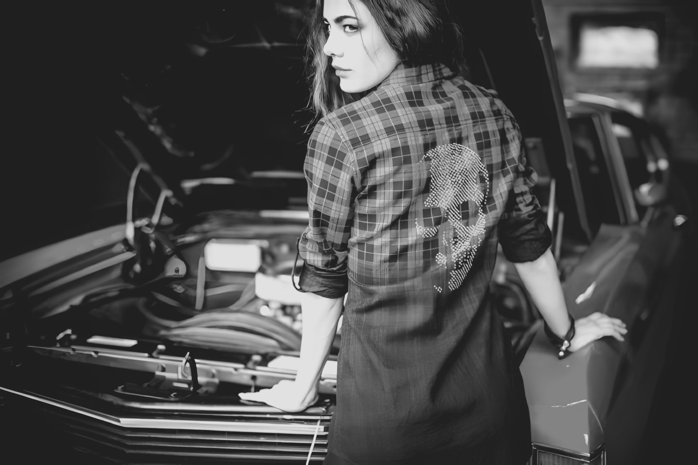 woman in black blazer smiling