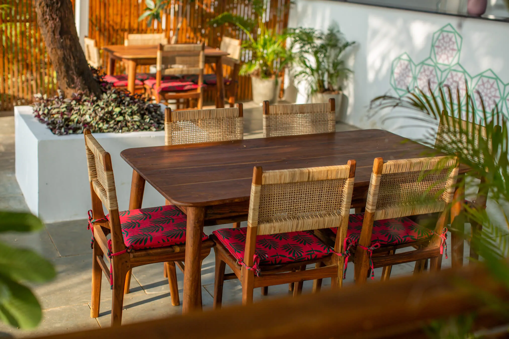 Inside the garden dining room at Jaali Kitchen