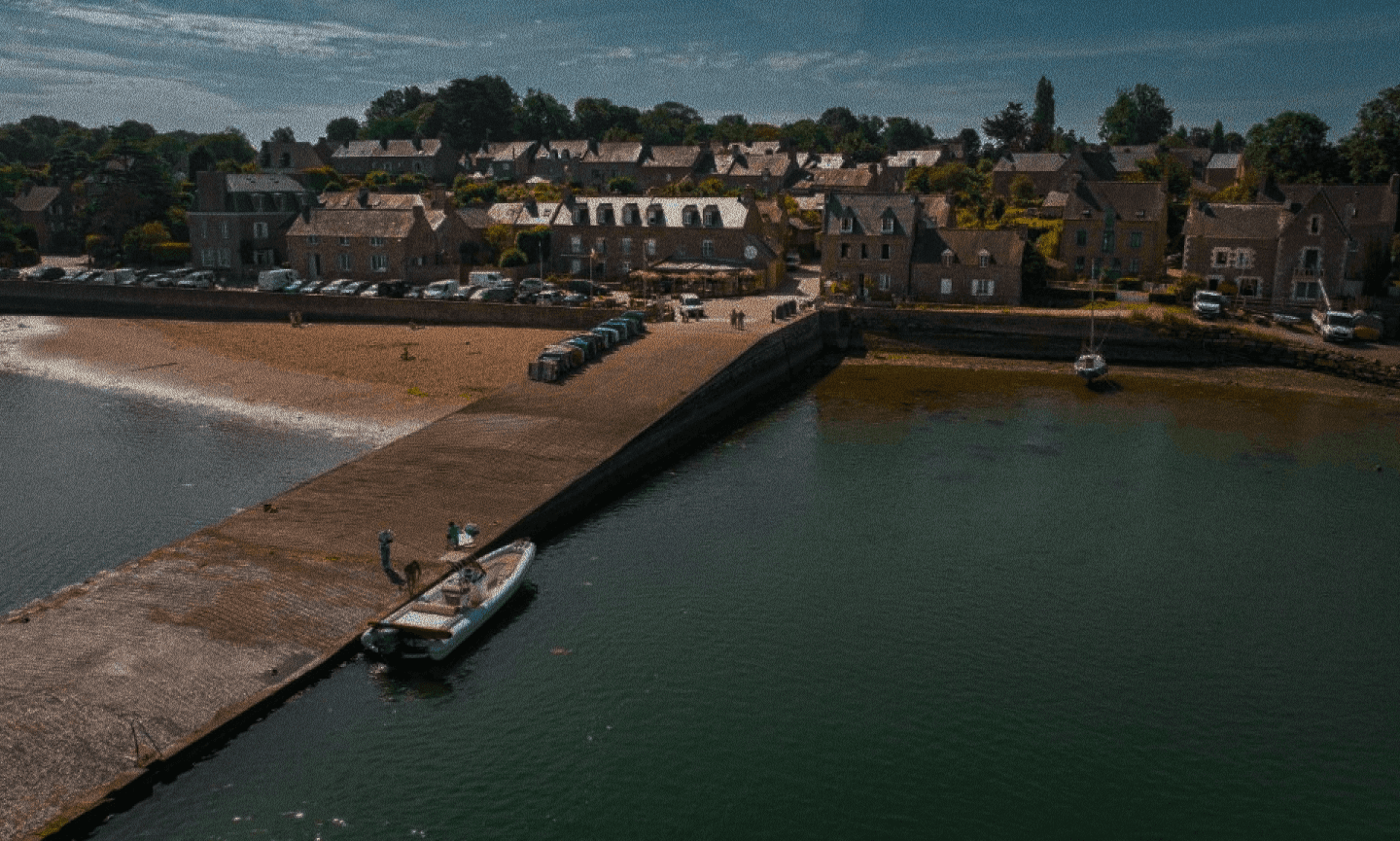 a group of boats floating on top of a body of water