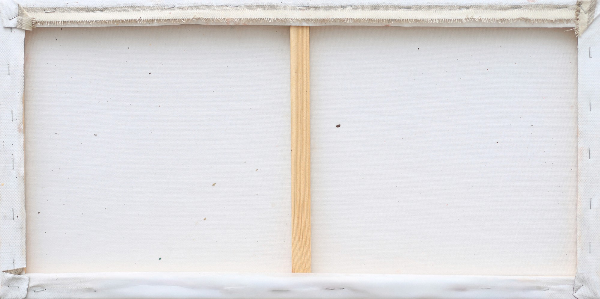 A blank canvas frame stretched over a wooden support frame with staples visible, showcasing the back side suited for painting or artistic projects.