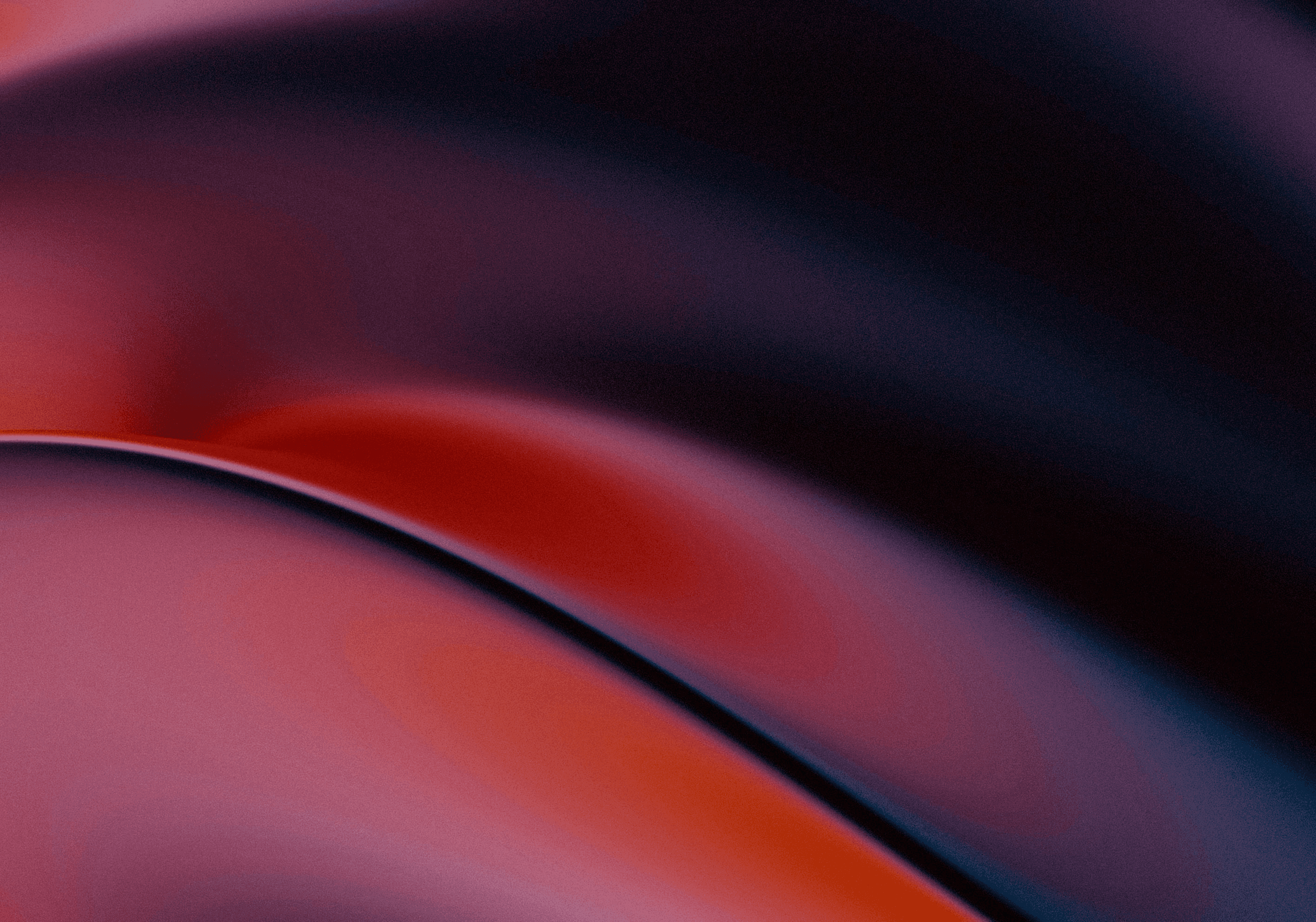 a black background with a pink and blue swirl