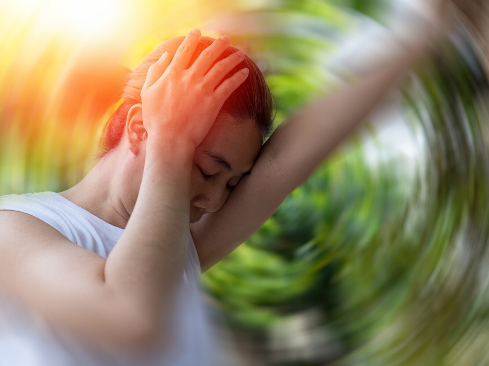 person feeling dizzy after too much heat exposure and fat loss