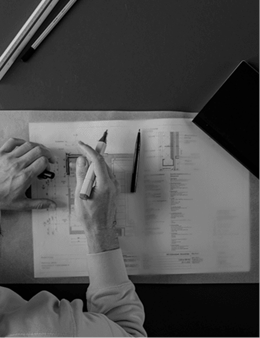 Toro Homes team reviewing architectural plans.
