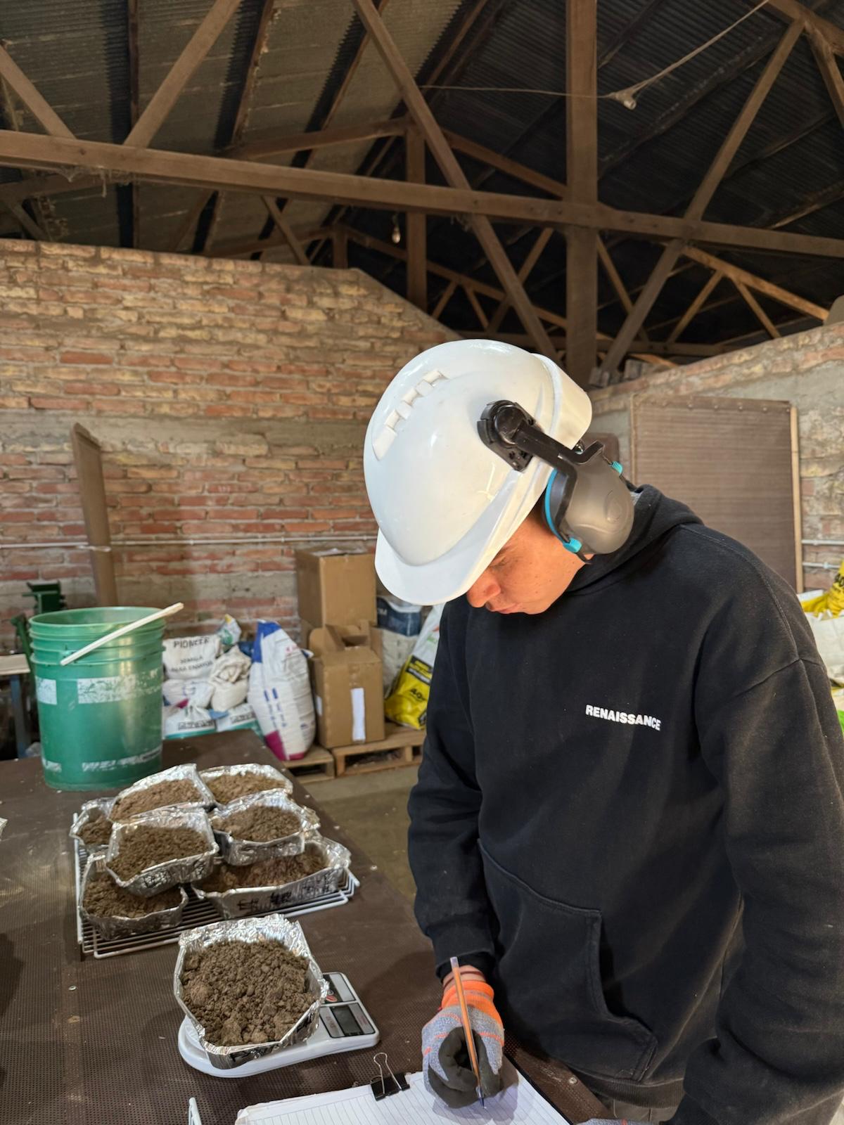 blue and red atv on brown soil under white clouds and blue sky during daytime
