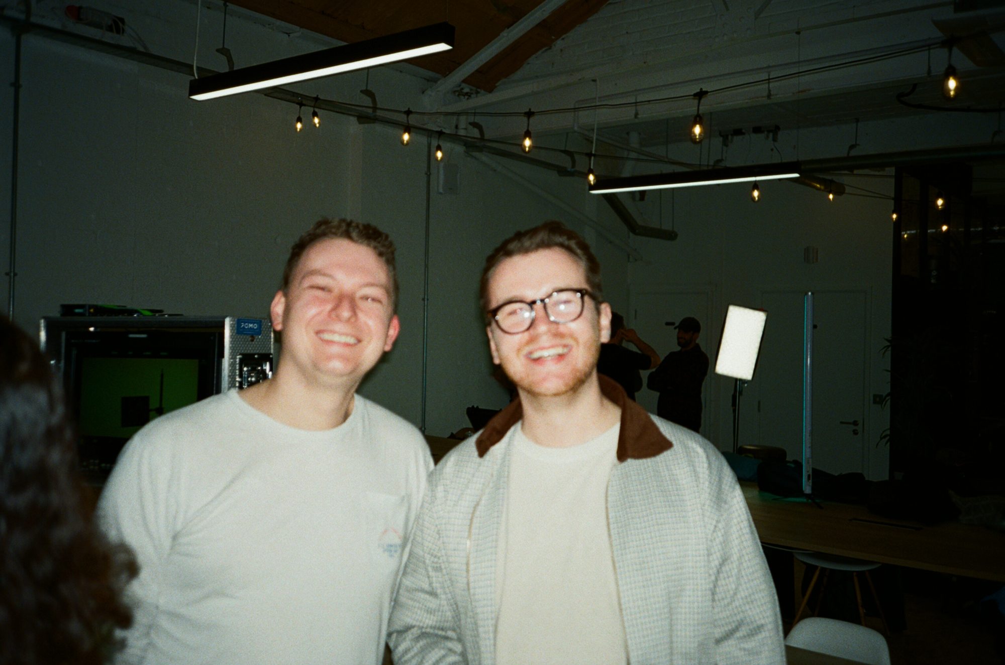 Two guests smiling at the kit demo day