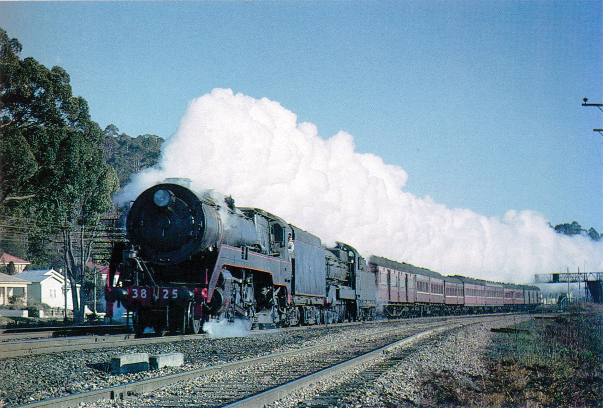 Locomotive 3825 hauls a mail train