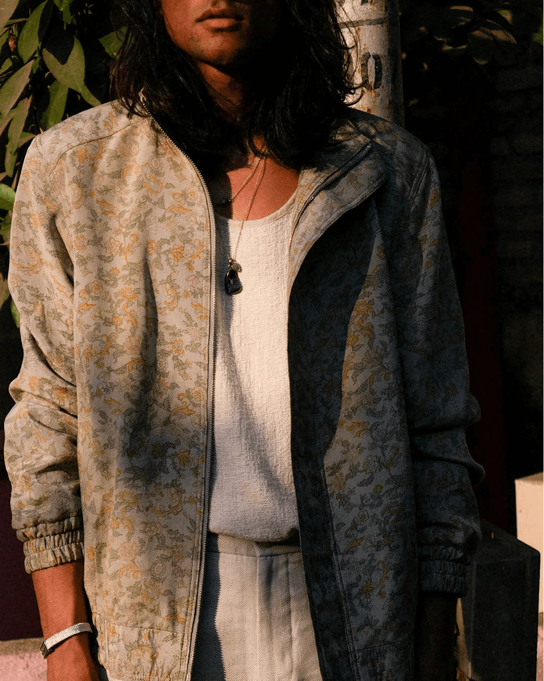 AKSA Bomber II is our printed silk bomber jacket, handcrafted by skilled artisans in-house using two one-of-a-kind vintage silk saree. 