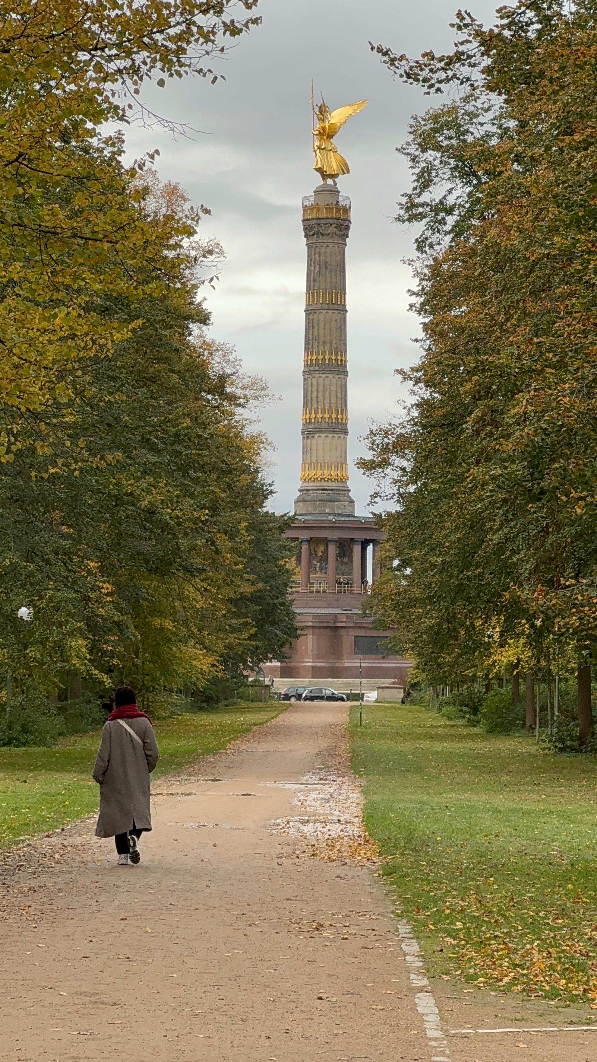 people in a large building with Tate Modern in the background