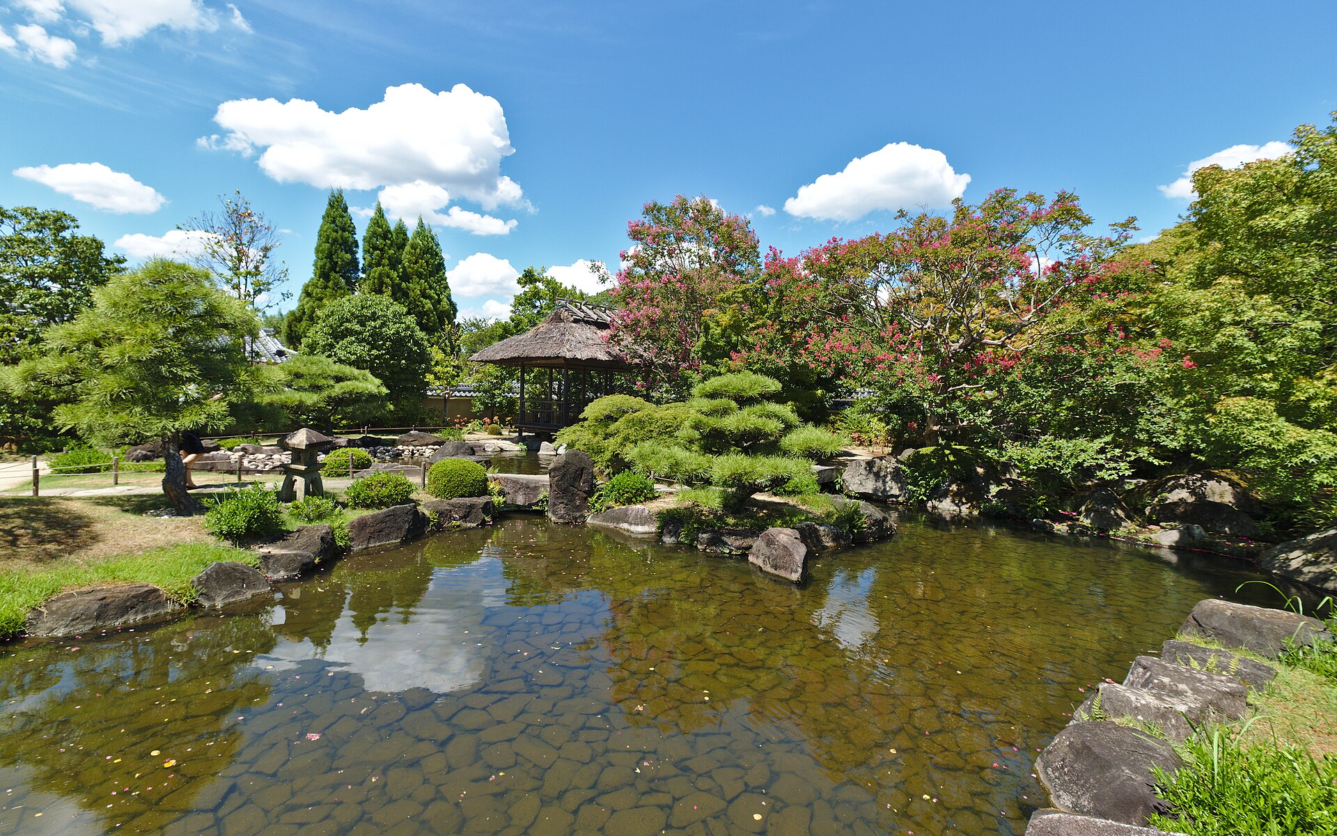 the eiffel tower is lit up at night