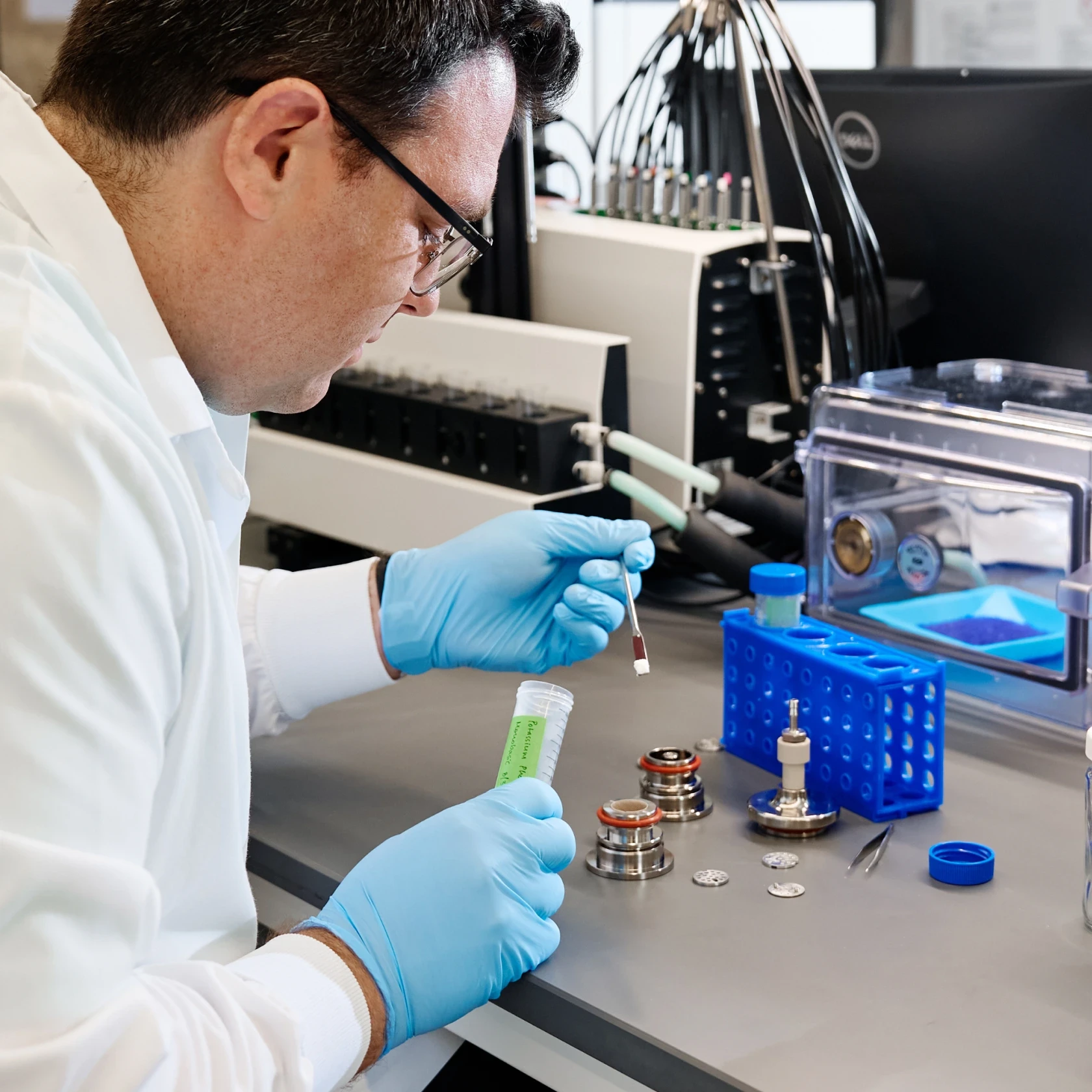 Scientist using a pipette in the lab