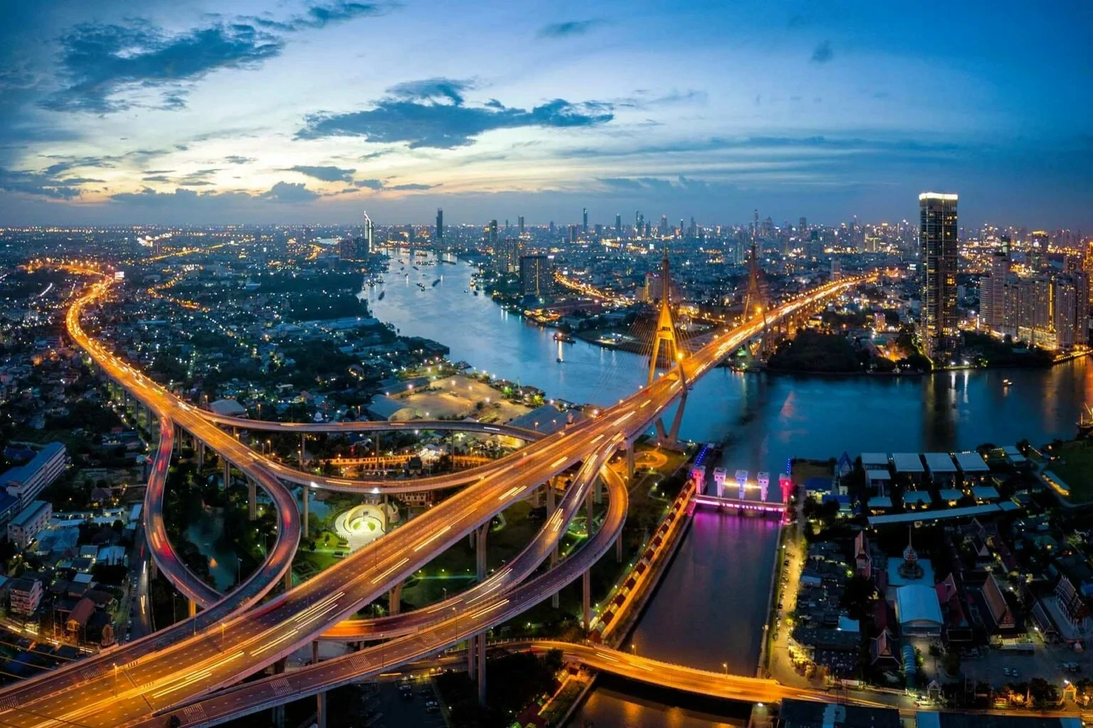 Bangkok highway bridge at twilight.