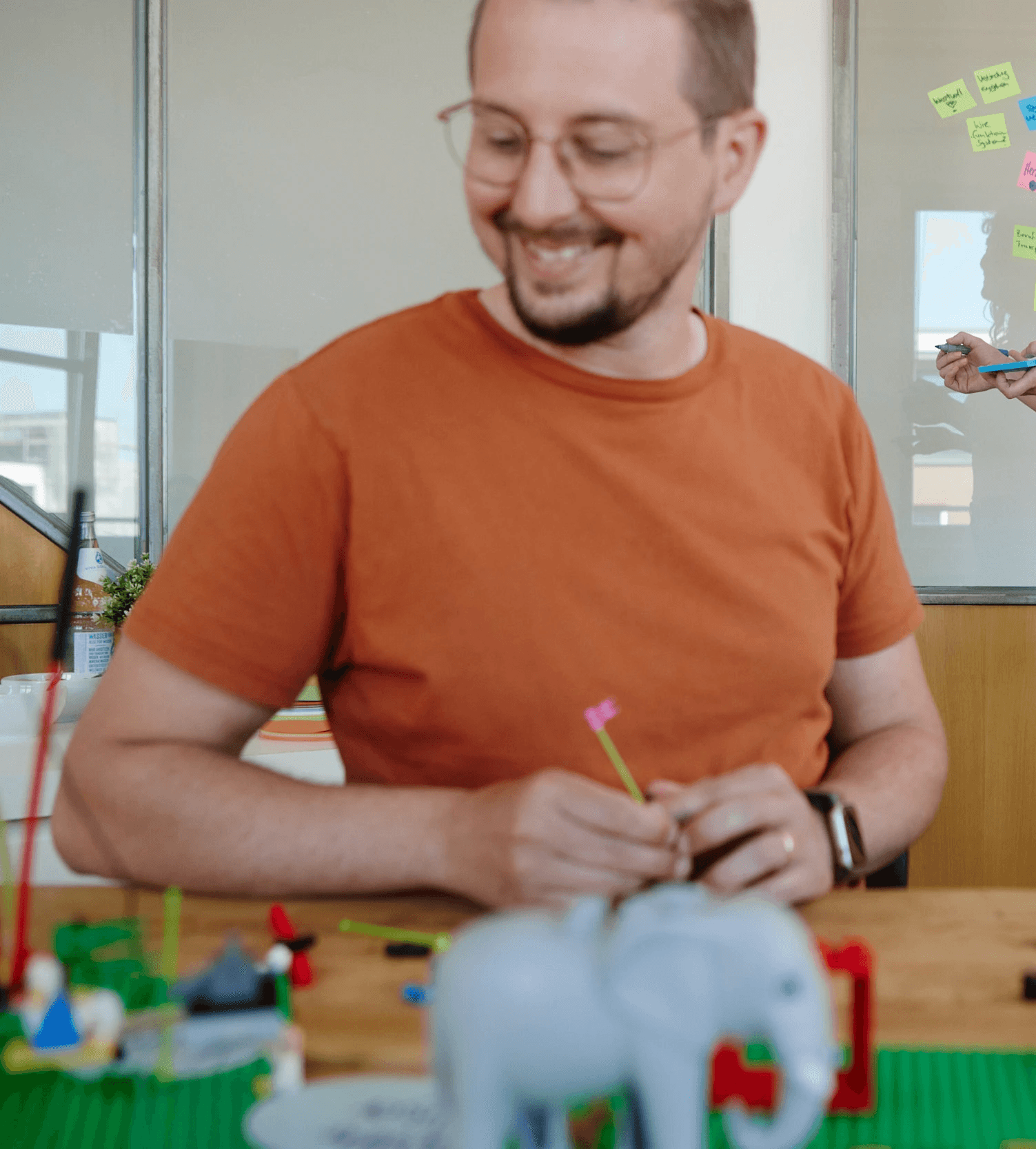 Close-up of a tree stump showing growth rings and a textured brown wood surface.