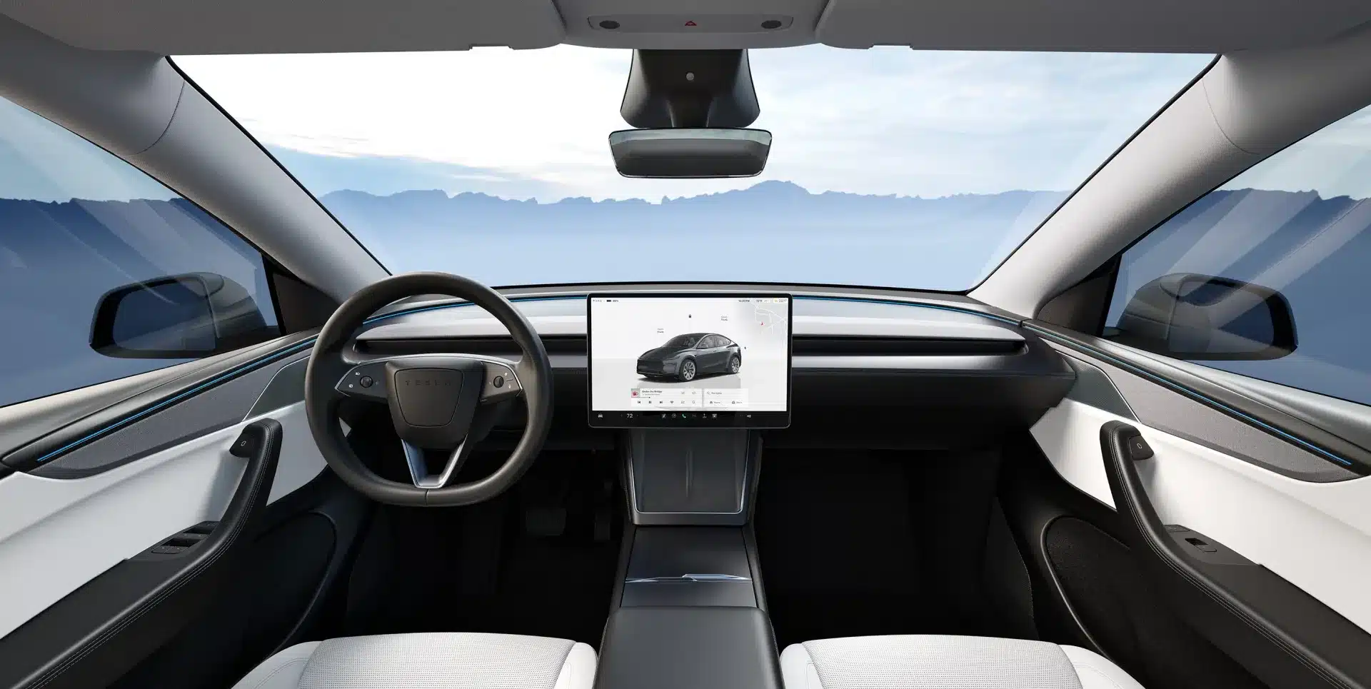 Habitacle de la Tesla Model 3 avec grand écran tactile central et design intérieur épuré