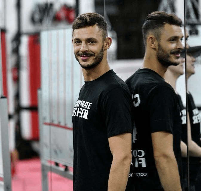 Danilo Dash Creati coaching Kids students during a boxing class.