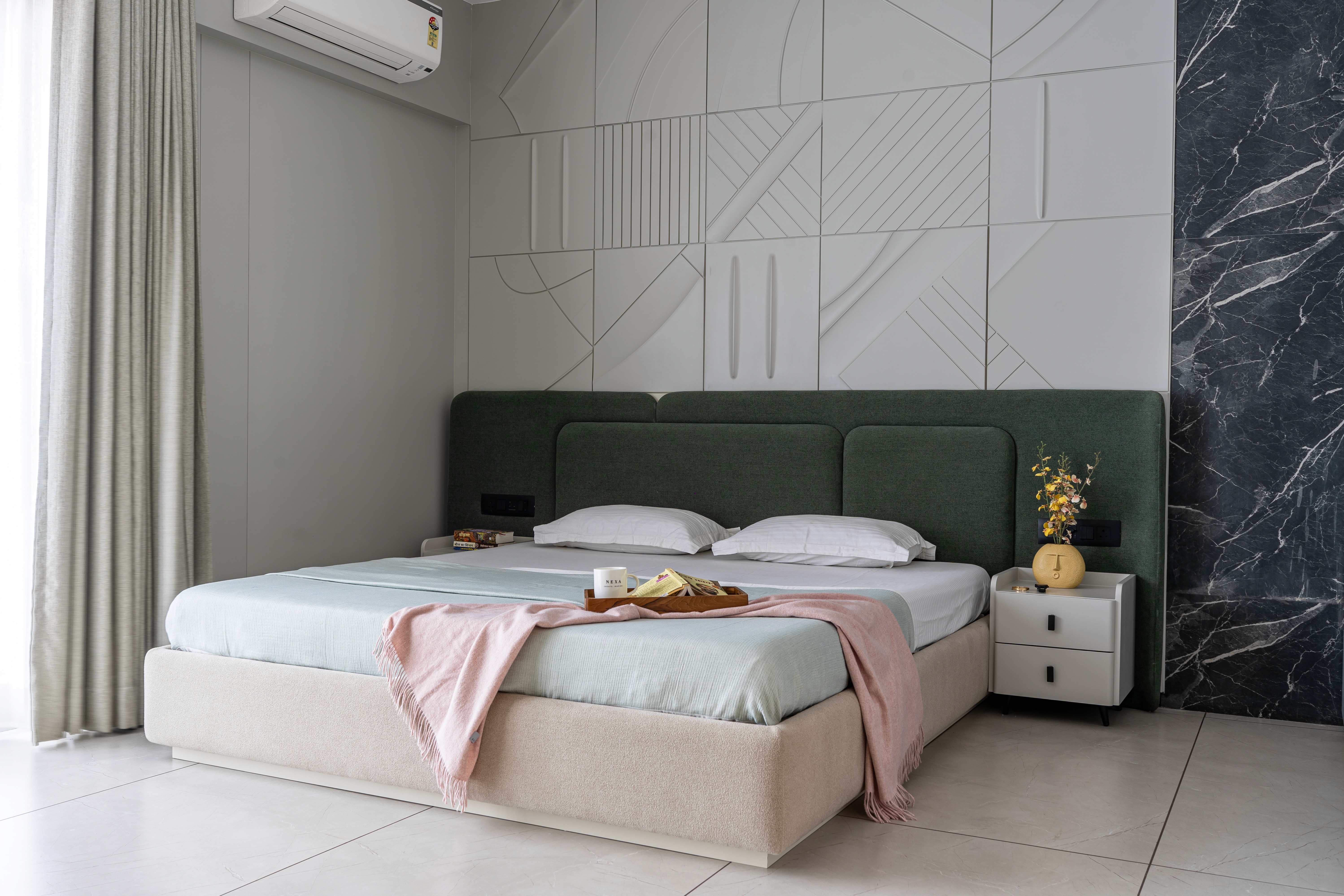 white mattress beside sectional sofa