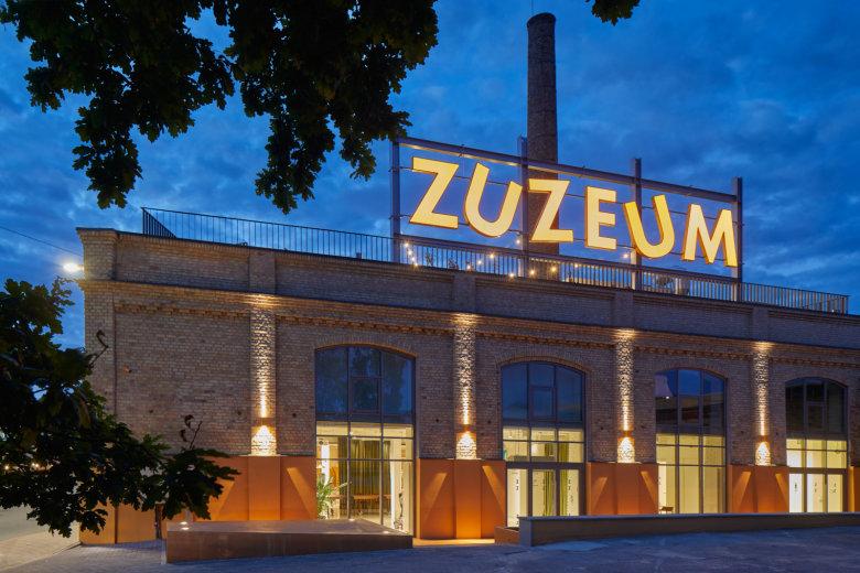 a building with trees and plants