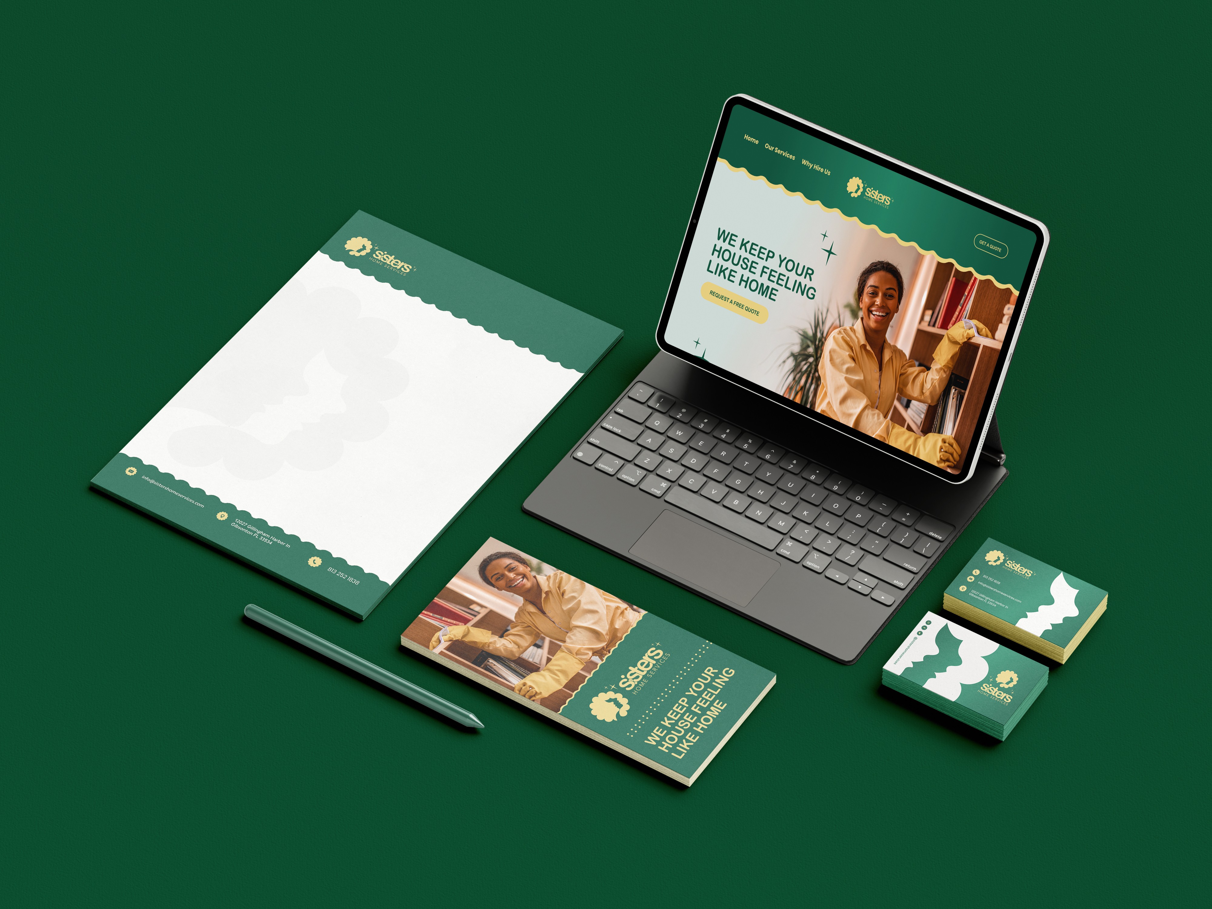Green-themed stationary and website displayed on tablet and paper.