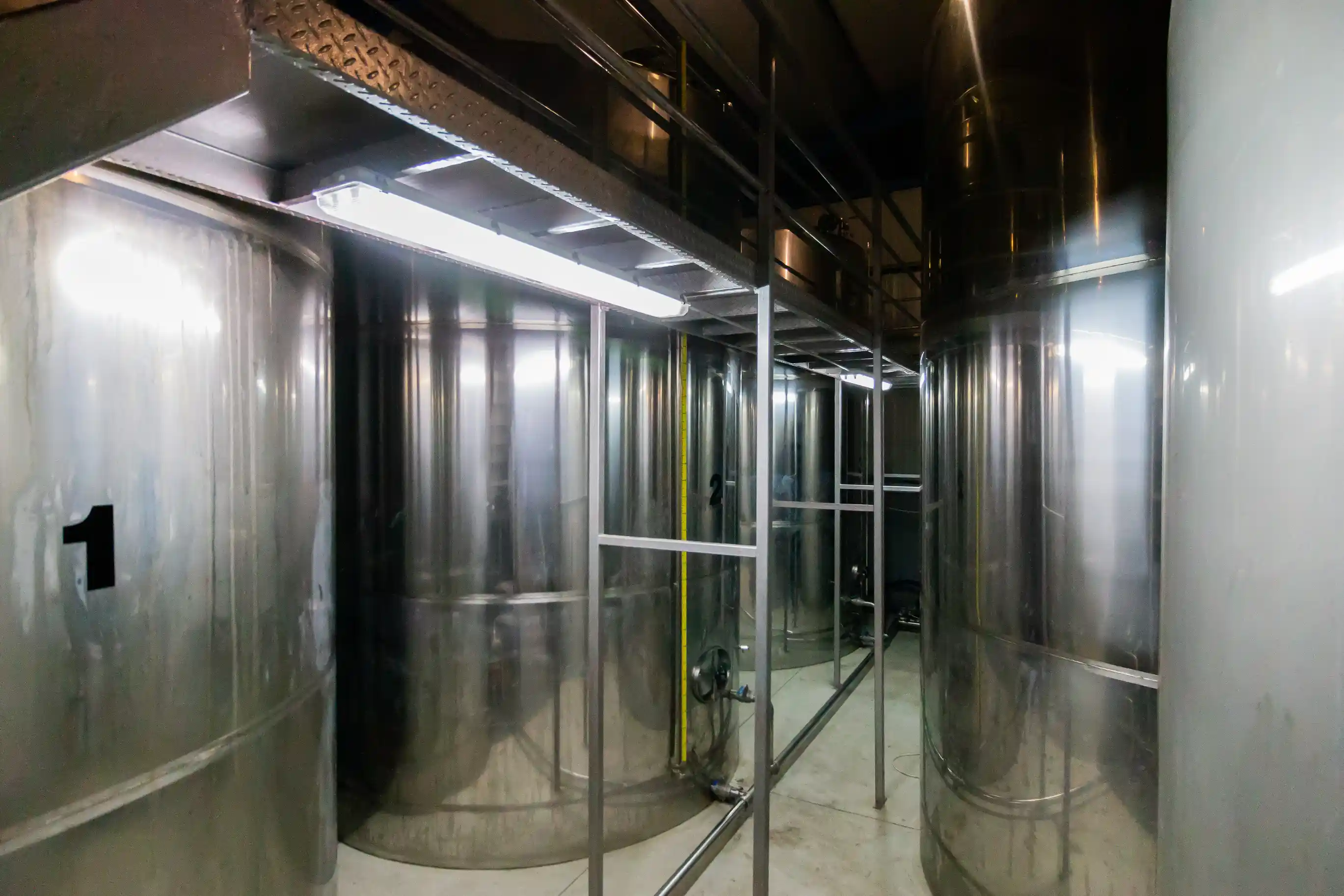 High-standard stainless steel tanks for olive oil storage at Fountas mill in Filiatra, Messenia.