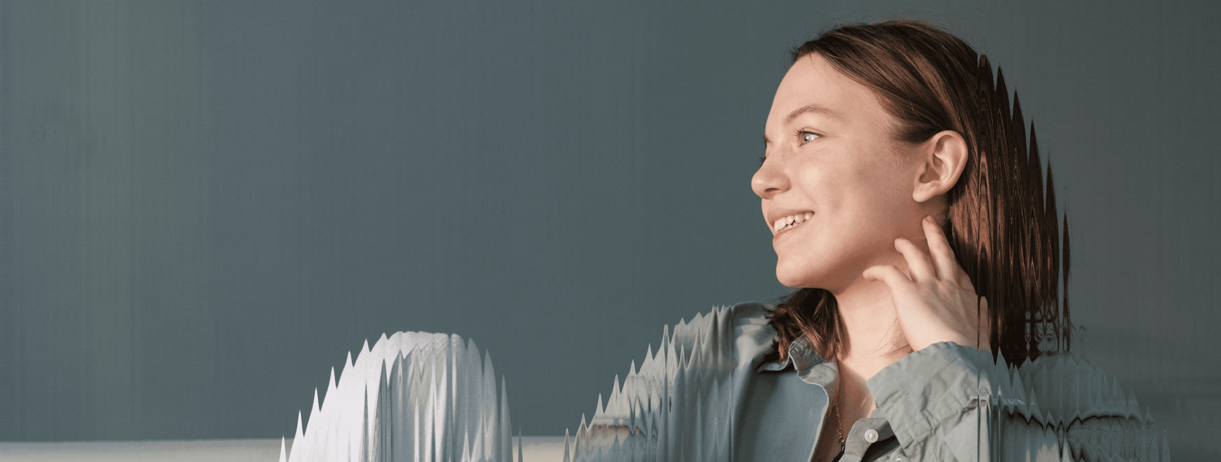 Smiling woman looking sideways