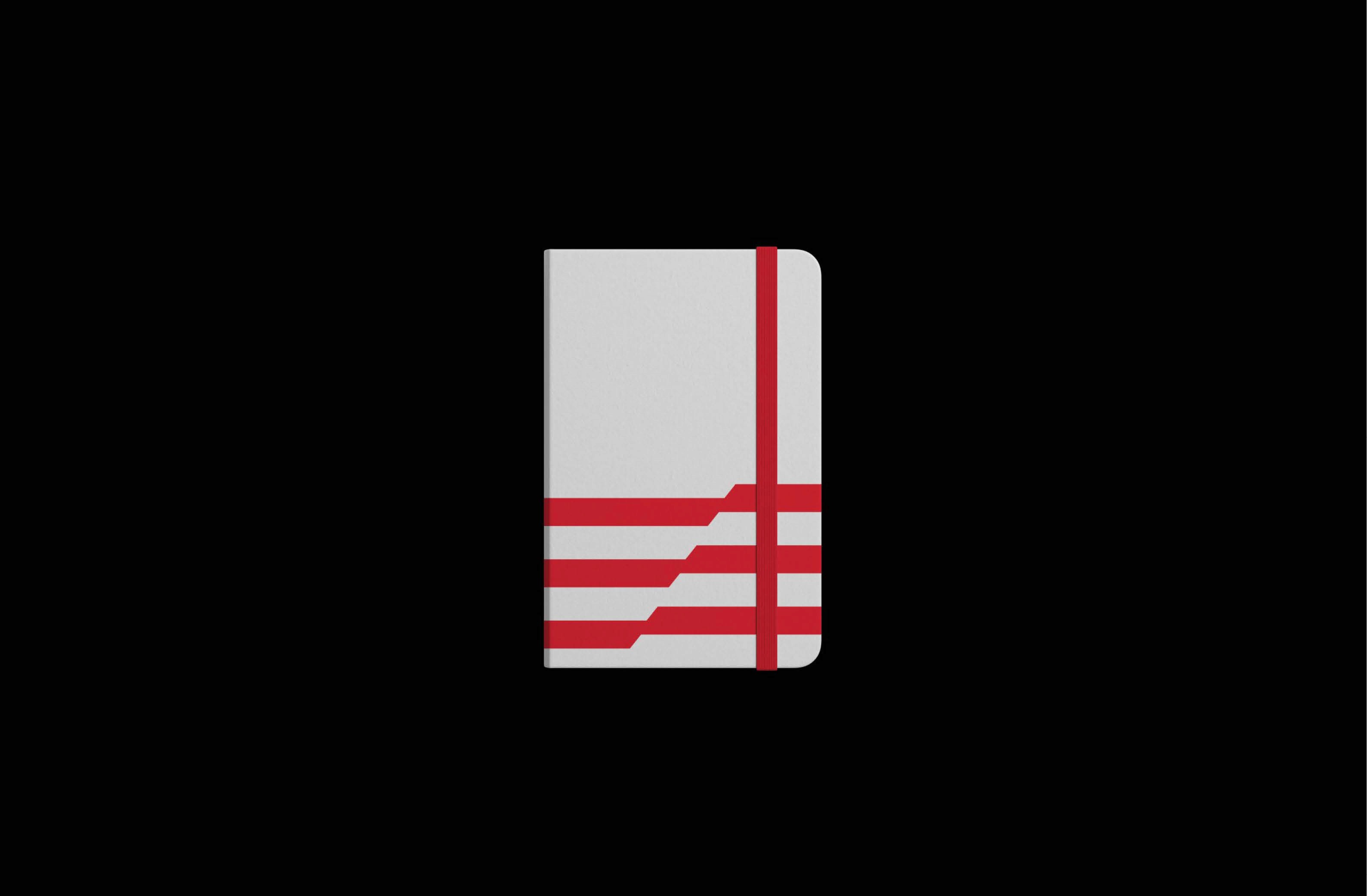 Stylish white notebook with red lines and elastic band, perfect for notes and sketches.