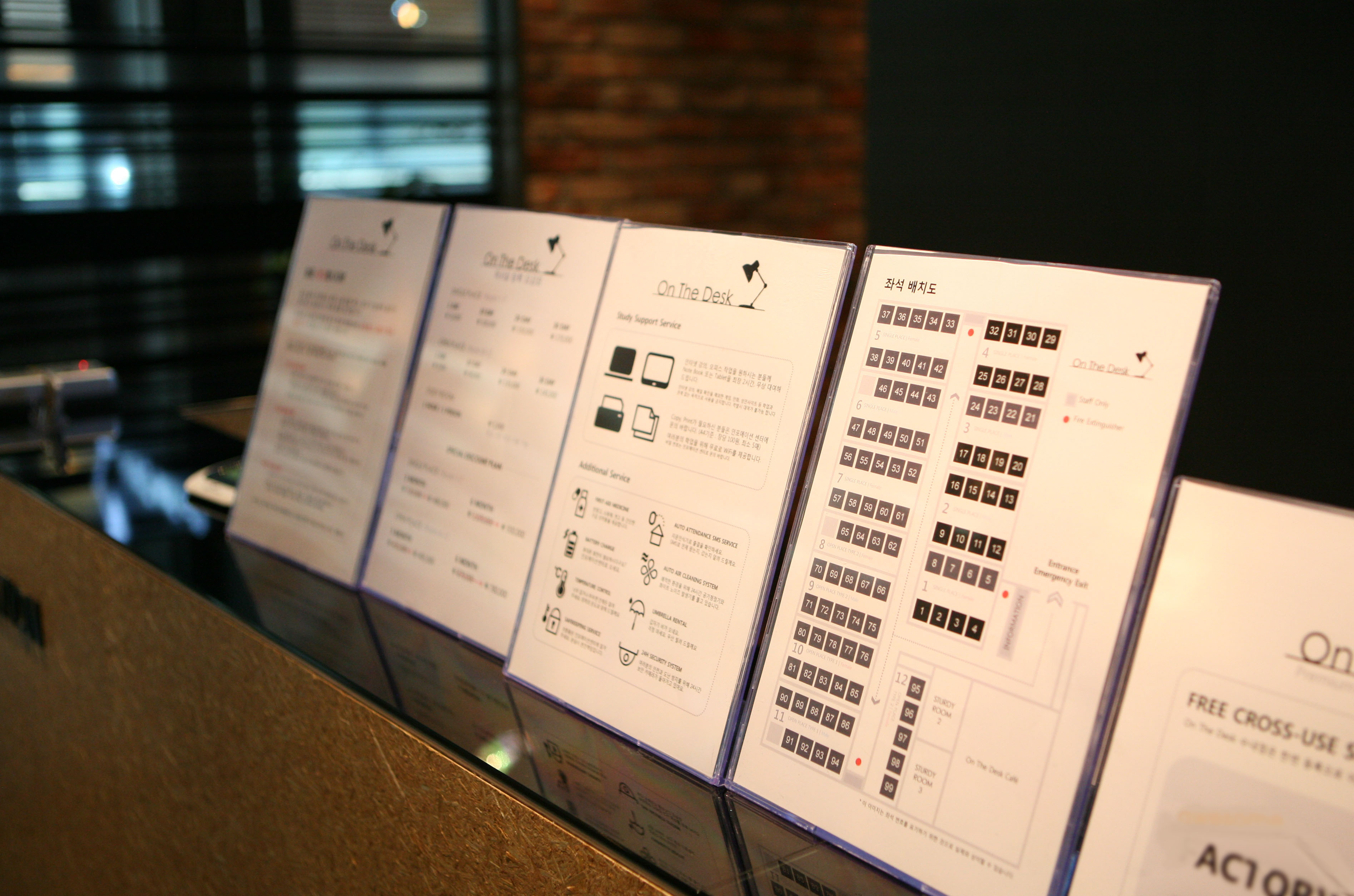 a man sitting in front of a laptop computer