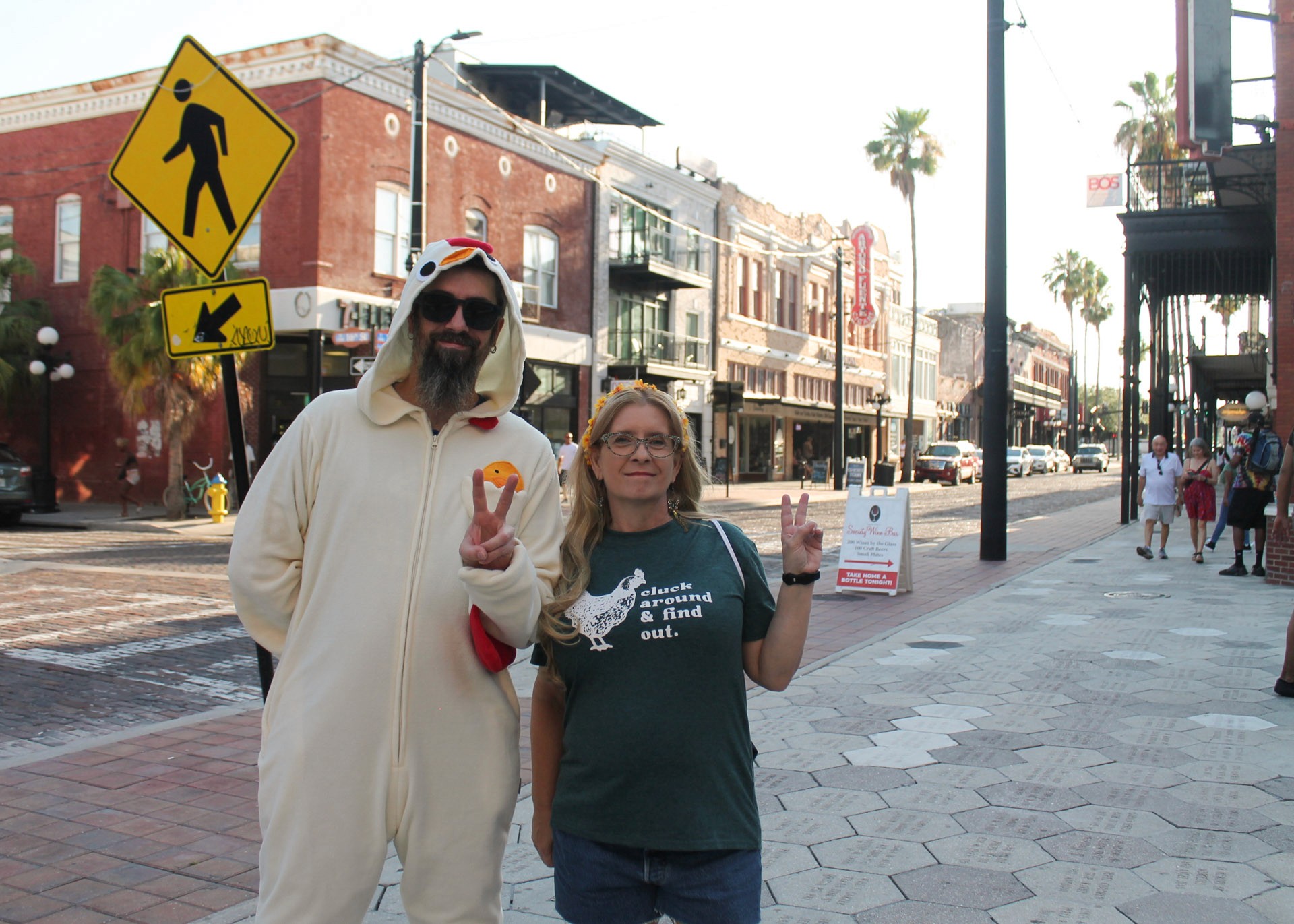 Man in rooster suit