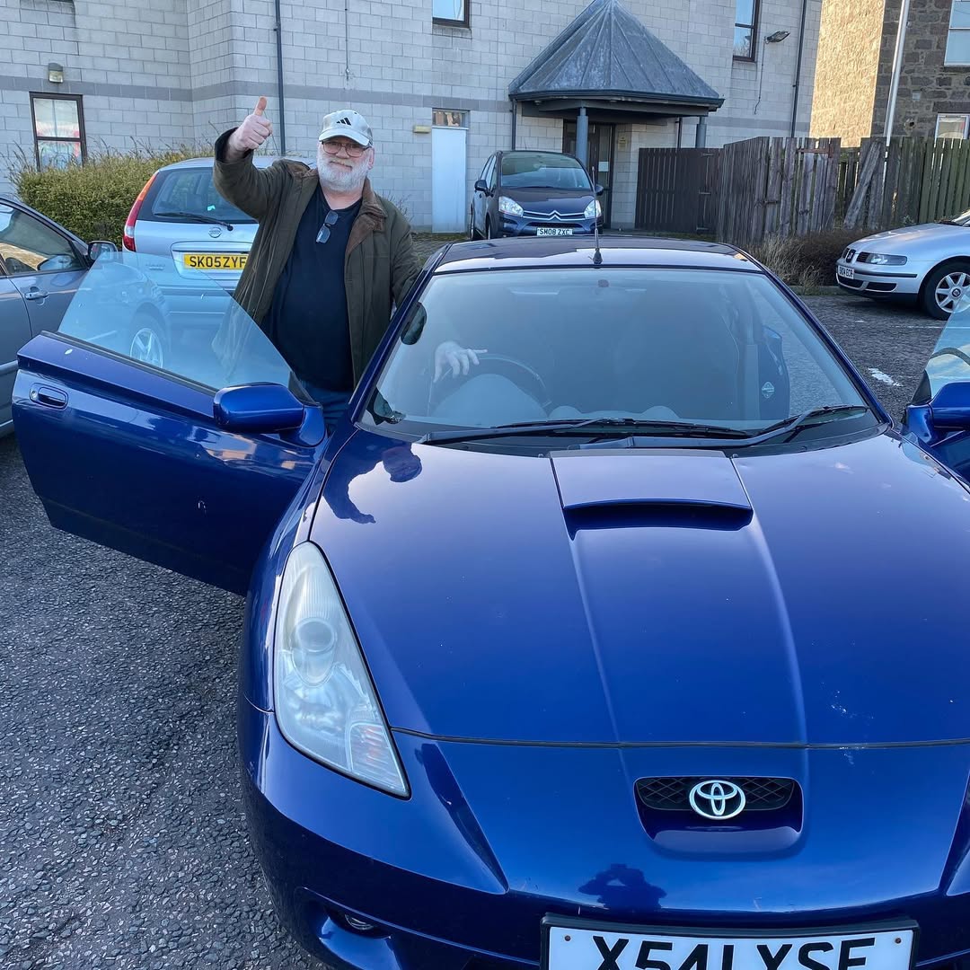 Person showing documentation to potential vehicle buyer