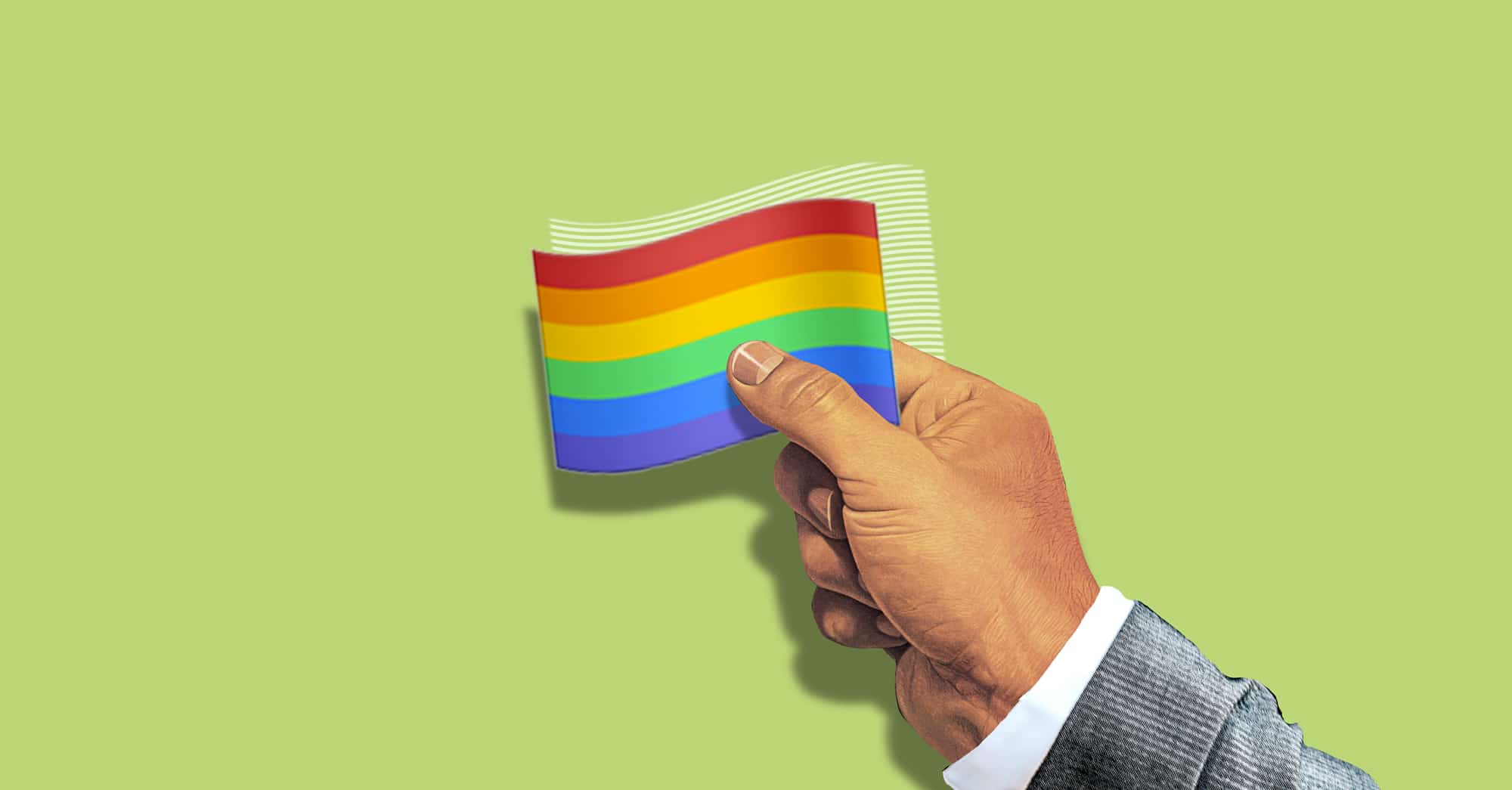 Mano sosteniendo bandera arcoíris sobre fondo verde, símbolo de orgullo LGBTQ+.
