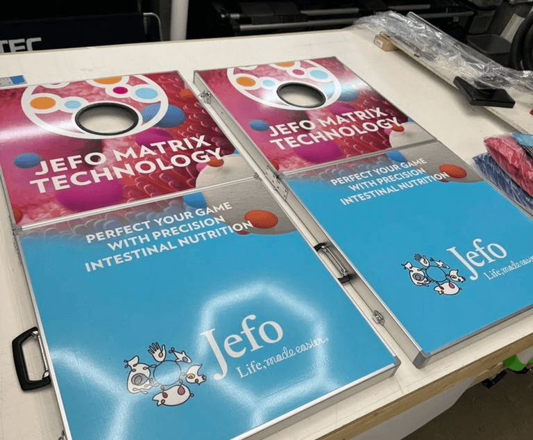 Custom printed cornhole sign with vinyl graphics produced by DisplayWorks Signs & Graphics in Calgary.