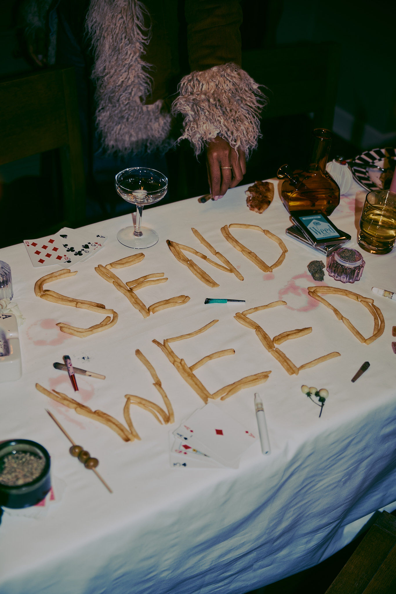 Woman with red hair covering mouth with hair