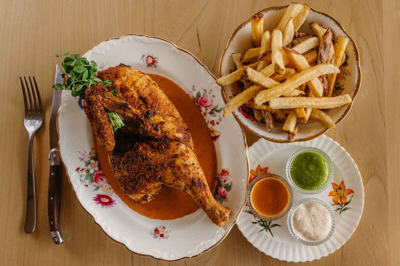 Half chicken roasted to order, fries, sauce paprikash