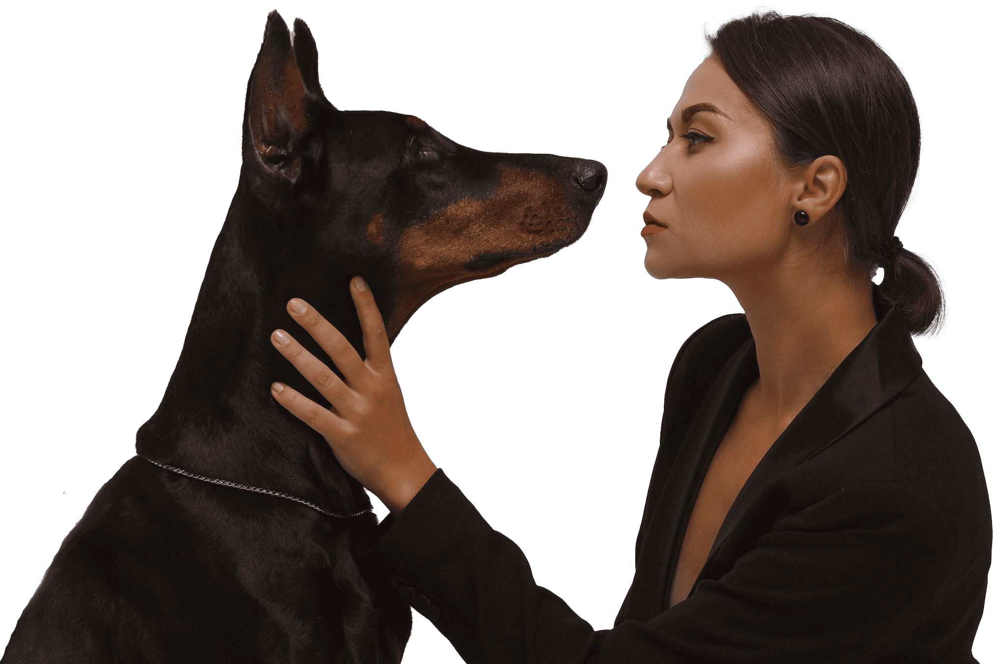 Woman holding her dog by the neck