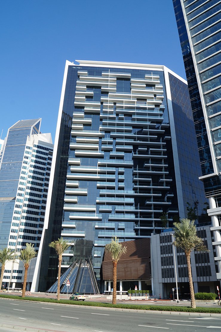 Exterior view of Marquise Square Tower. Trust our real estate team for luxury residential investments in Dubai.