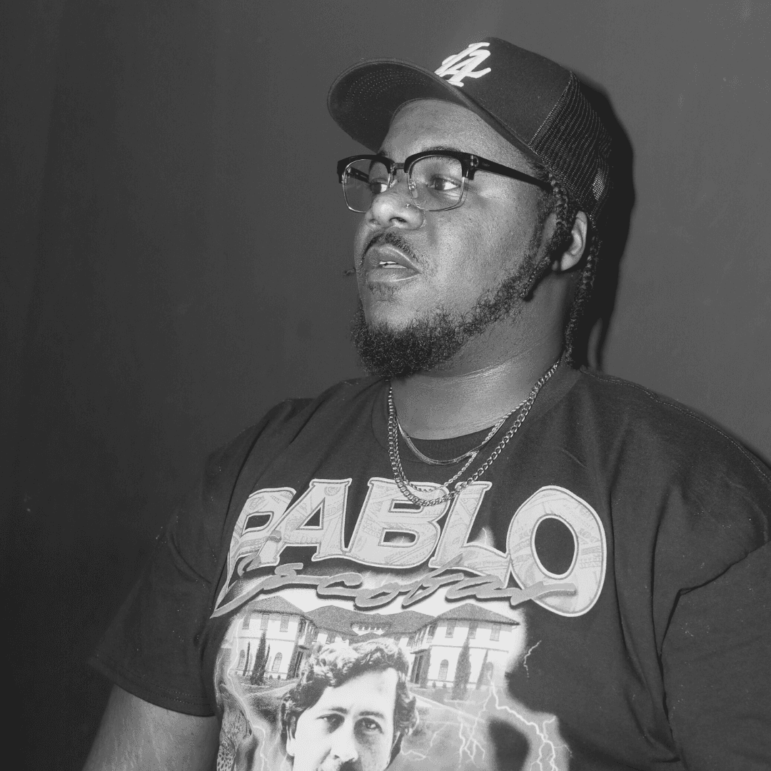 close-up image of a guys shirt wearing a lanyard