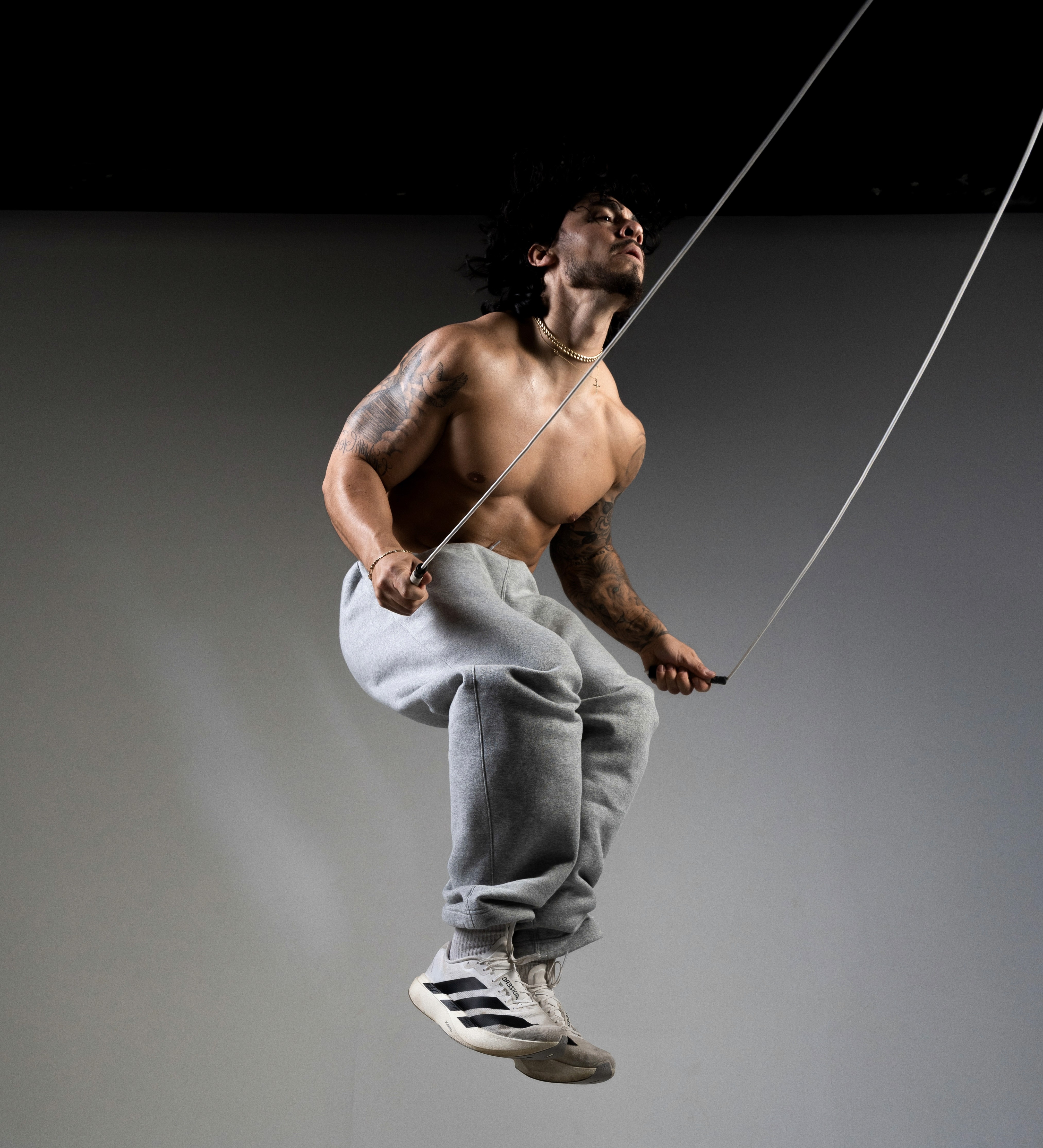 A stylish girl holding a laptop