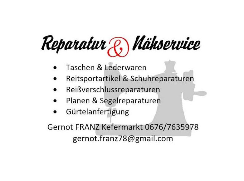 Close-up of lush, dark green leaves, some glossy and wet, against a muted background.