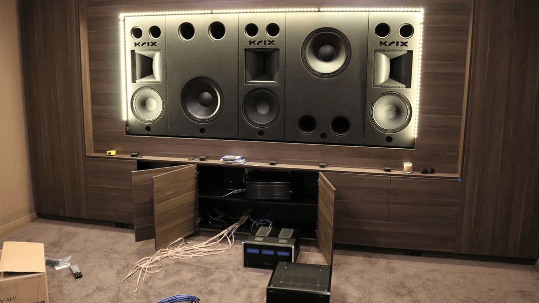 Large KRIX speakers built into custom cabinet
