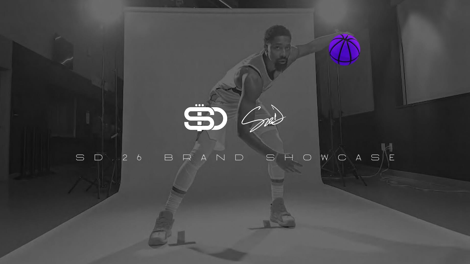 SD.26 brand showcase hero image featuring Spencer Dinwiddie playing basketball with overlaid SD logo, signature, and purple basketball brand elements