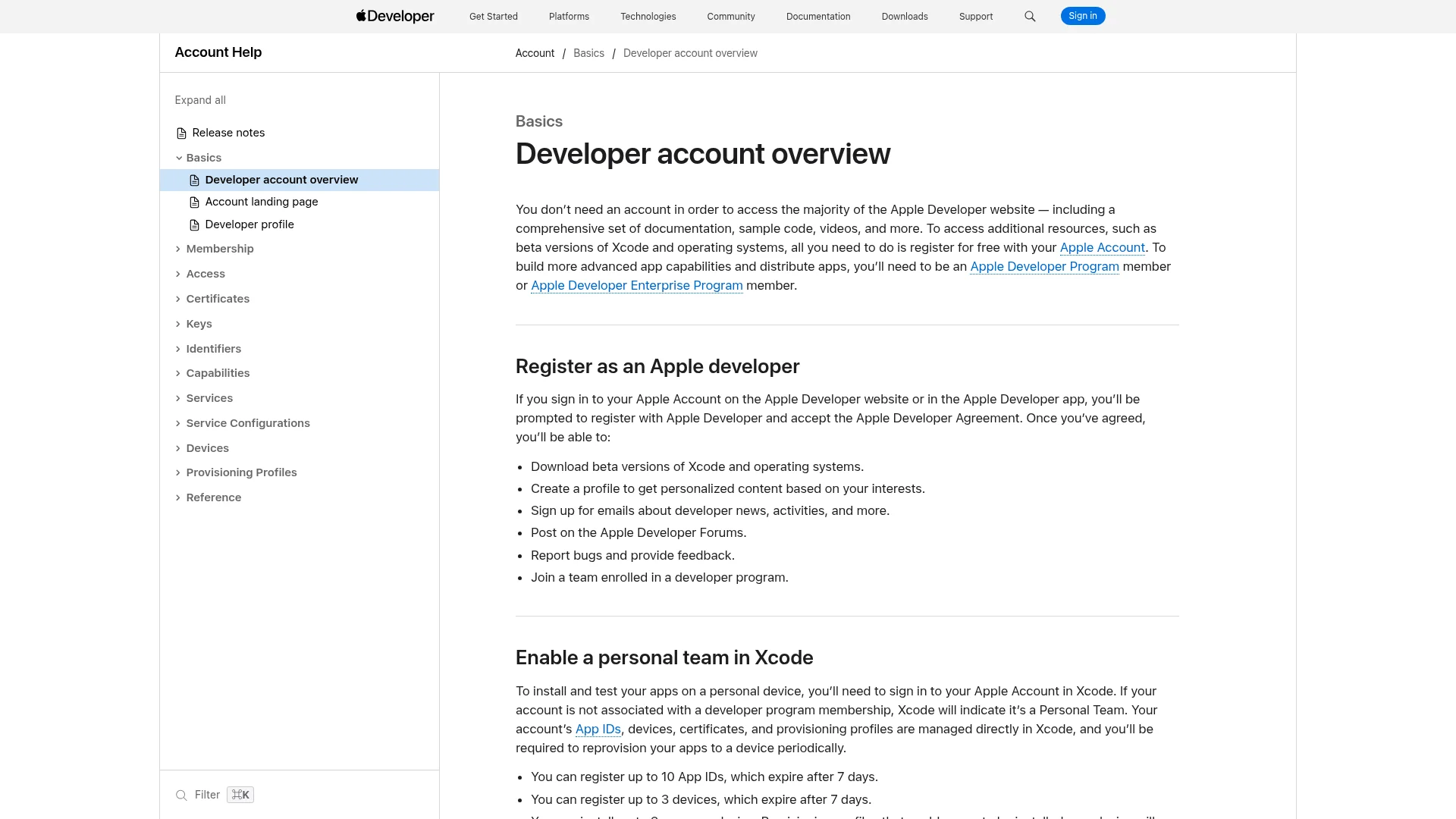 Apple developer account overview page comparing free registration with paid program membership