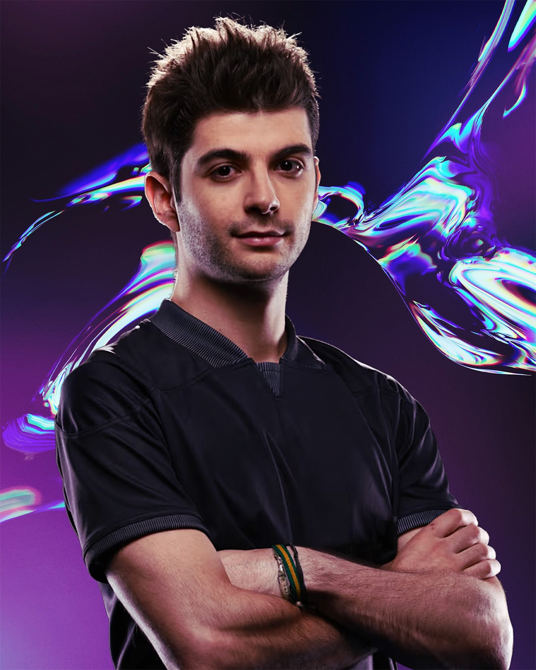 Portrait of a woman with long, smooth hair swept to the side, in a dark t-shirt, on a plain background.